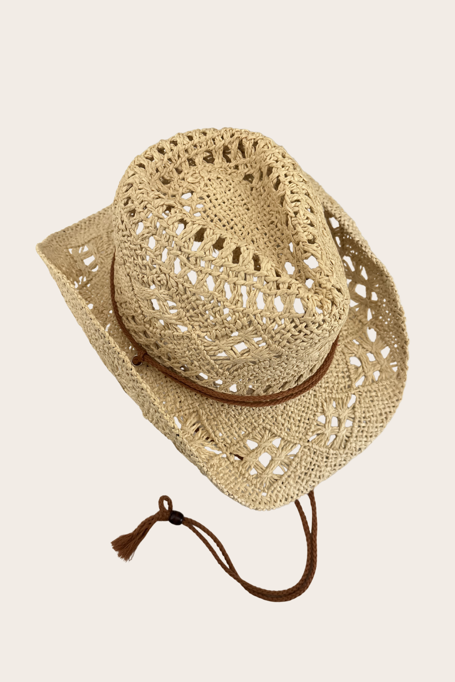 Cam Beige Cowboy Hat featuring a beige open-weave western hat with a chin tie