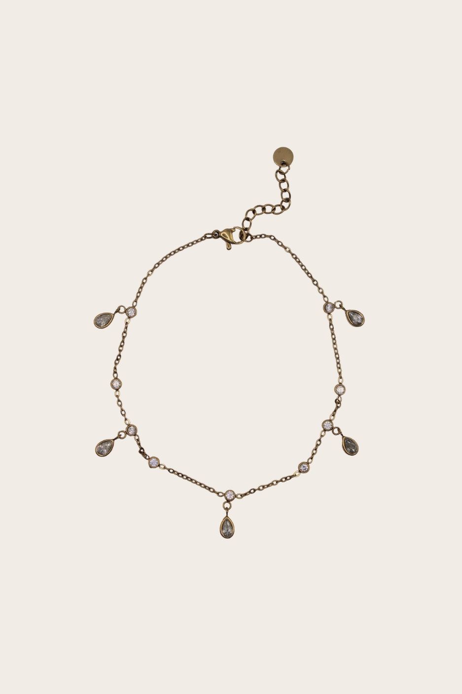 Dangling Drops Anklet featuring a fine chain with small dangling teardrop accents