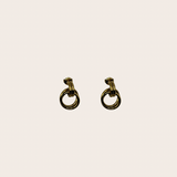 Frances Earrings, gold earrings with a polished golden silhouette designed to frame the face with modern presence