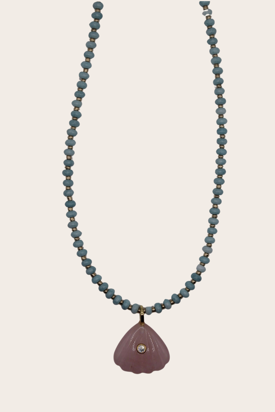 Blue Pinky Shell Chain featuring deep blue beads and a pink shell pendant