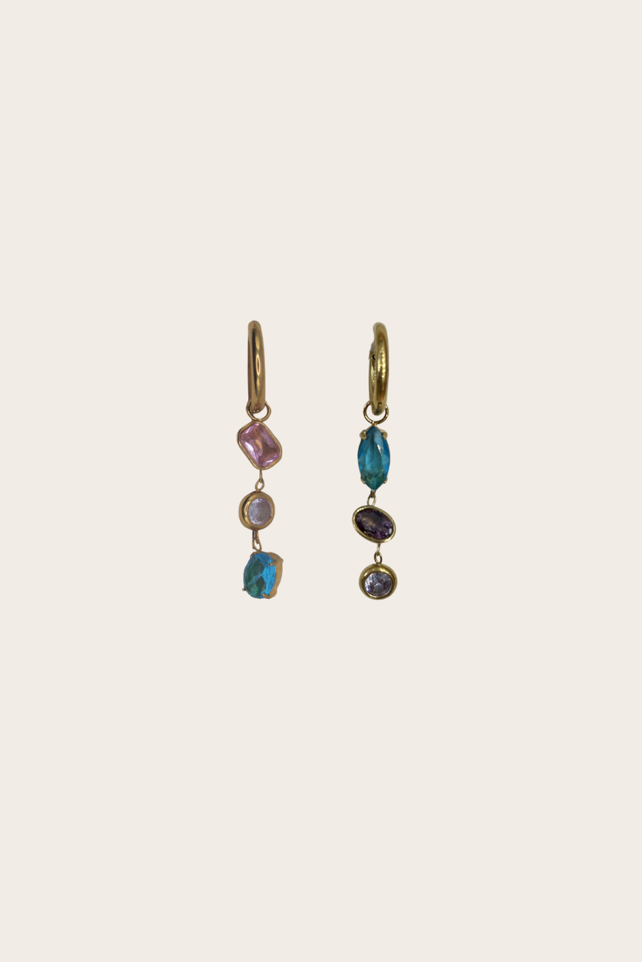 Sky Huggies featuring small hoops with colorful geometric drops