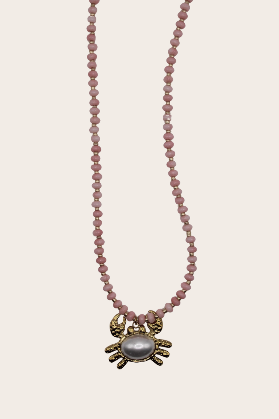 Pinky Pearl Crab Chain featuring soft pink beads and a pearl-accented crab charm