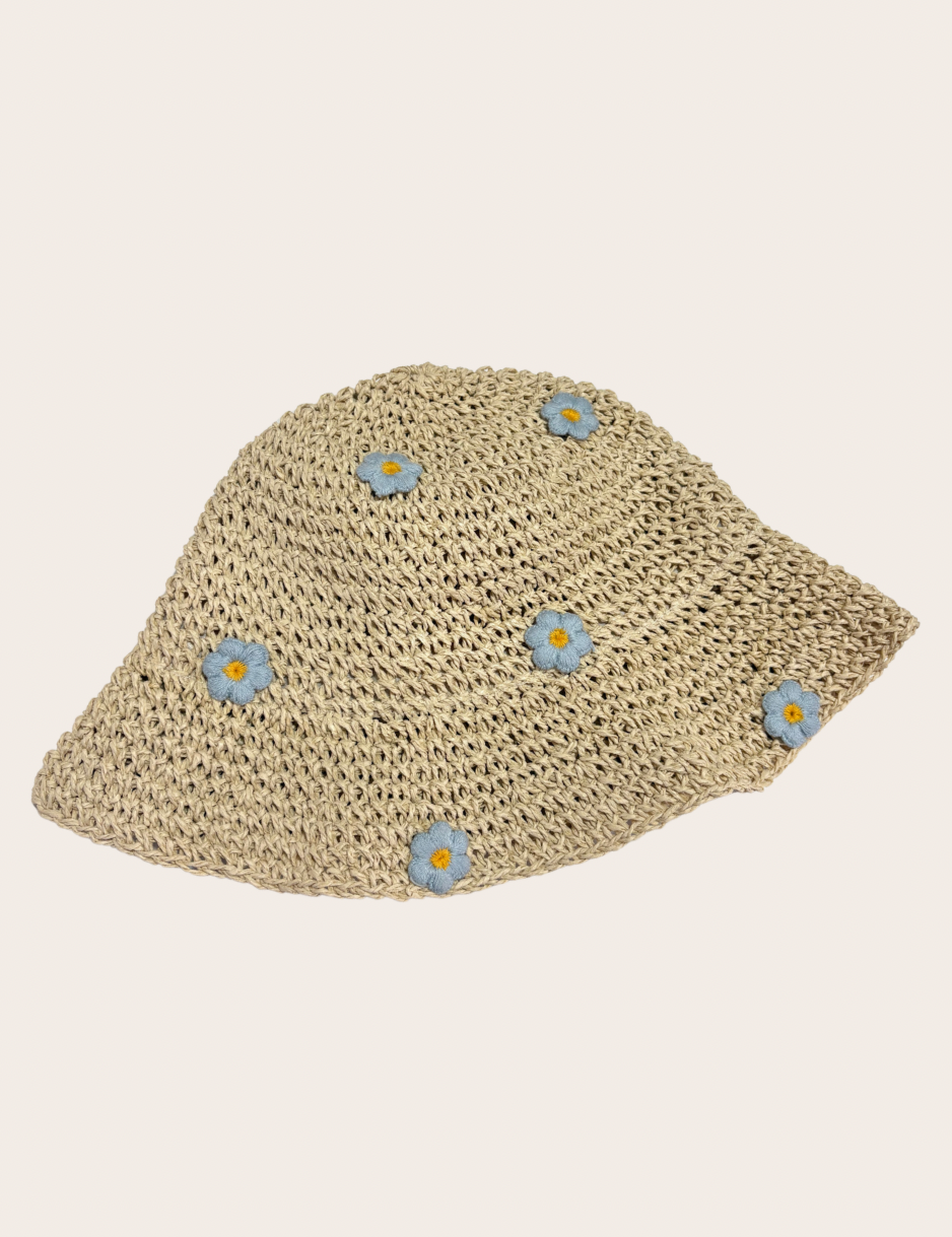 Woven straw hat decorated with feminine blue floral details
