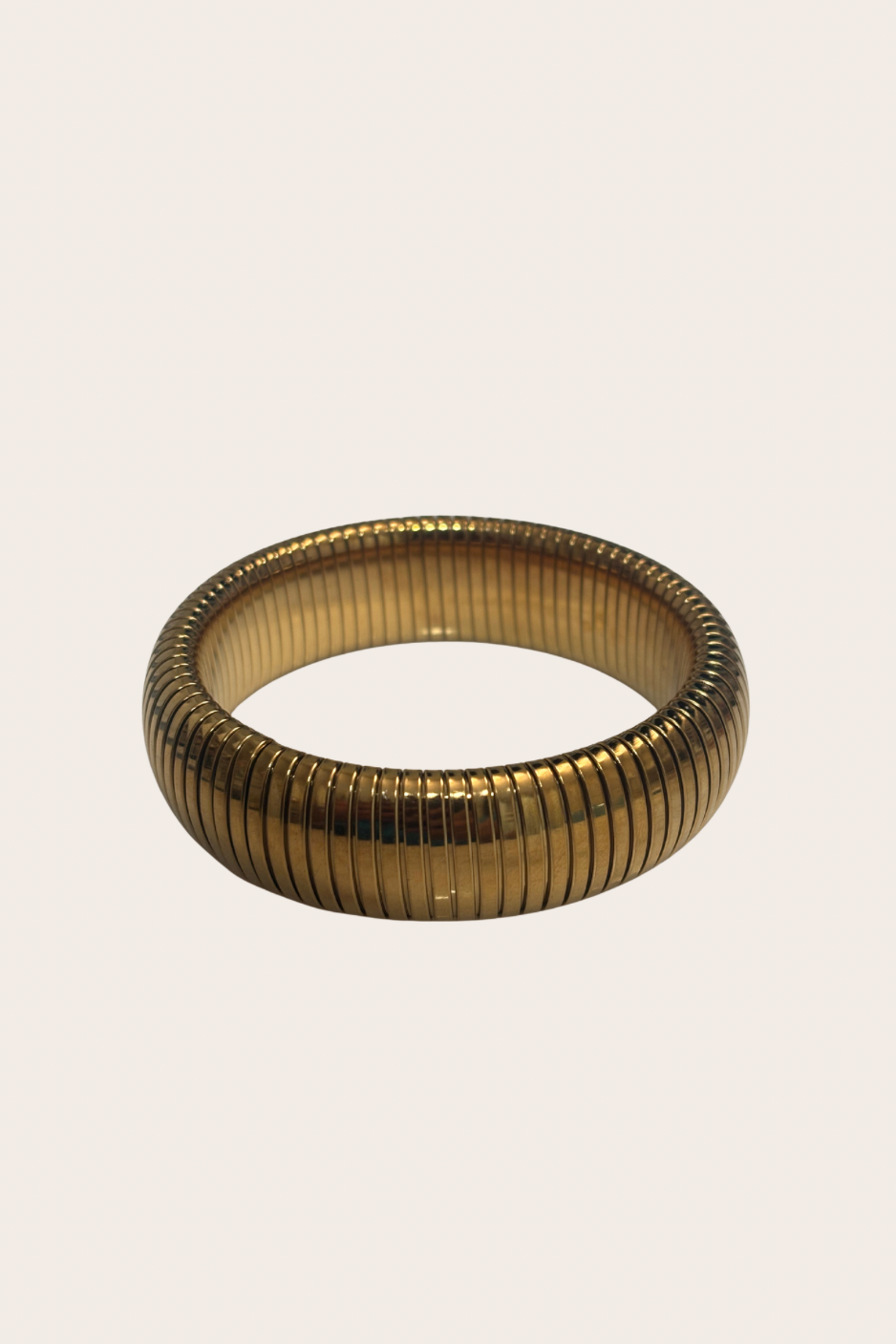 Indira Chunky Bangle, gold bangle featuring a substantial chunky silhouette with a polished finish