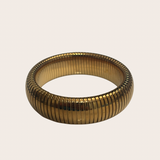 Indira Chunky Bangle, gold bangle featuring a substantial chunky silhouette with a polished finish