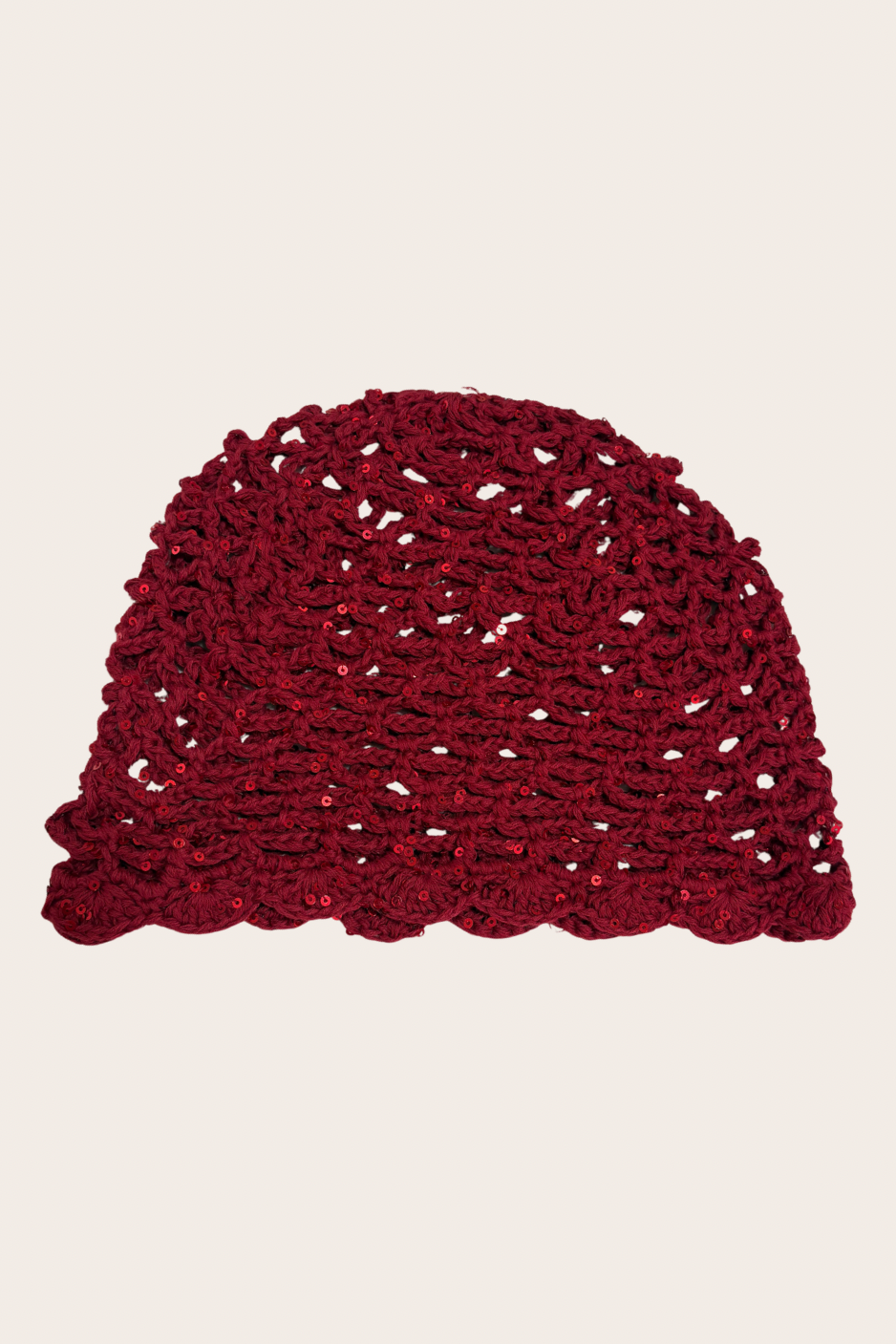 Red crochet hat with delicate glitter accents