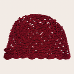 Red crochet hat with delicate glitter accents
