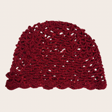 Red crochet hat with delicate glitter accents