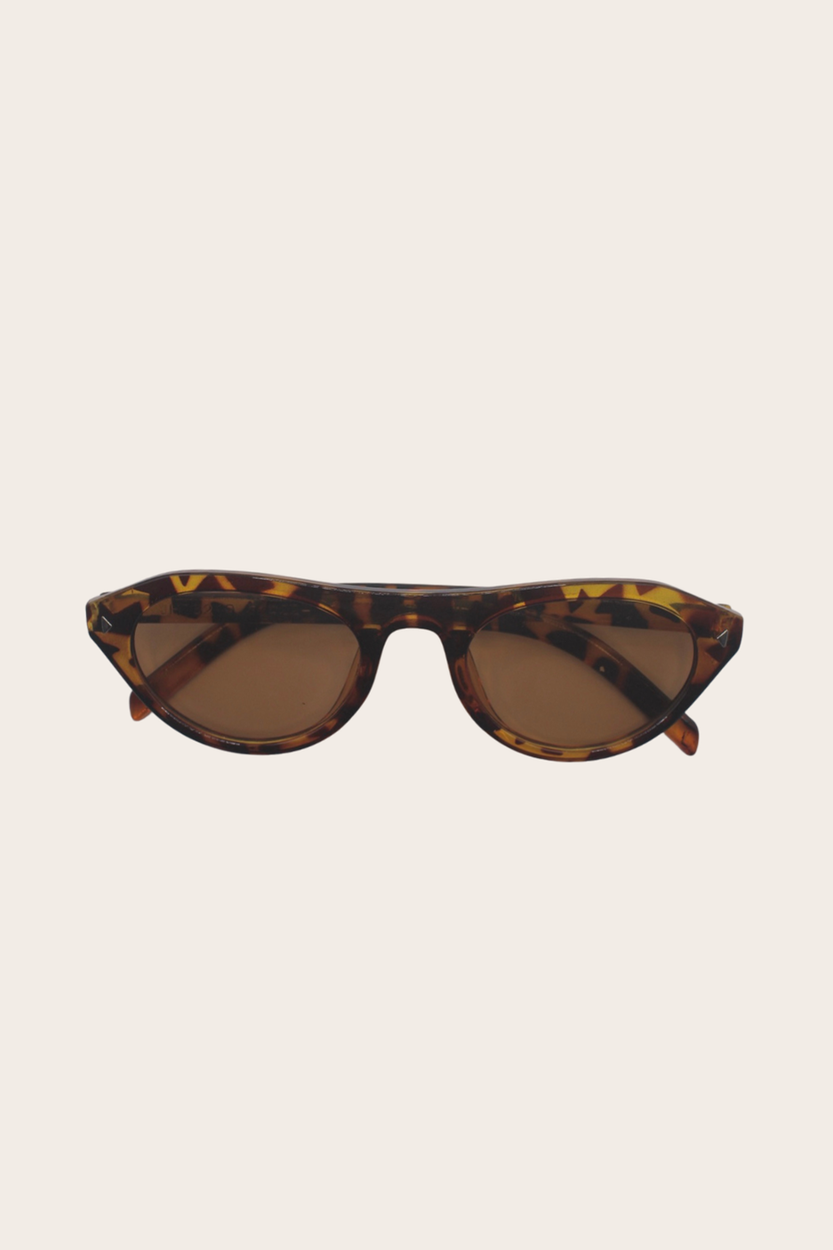 Priscila Print Sunglasses featuring a bold printed frame with a softly rounded shape