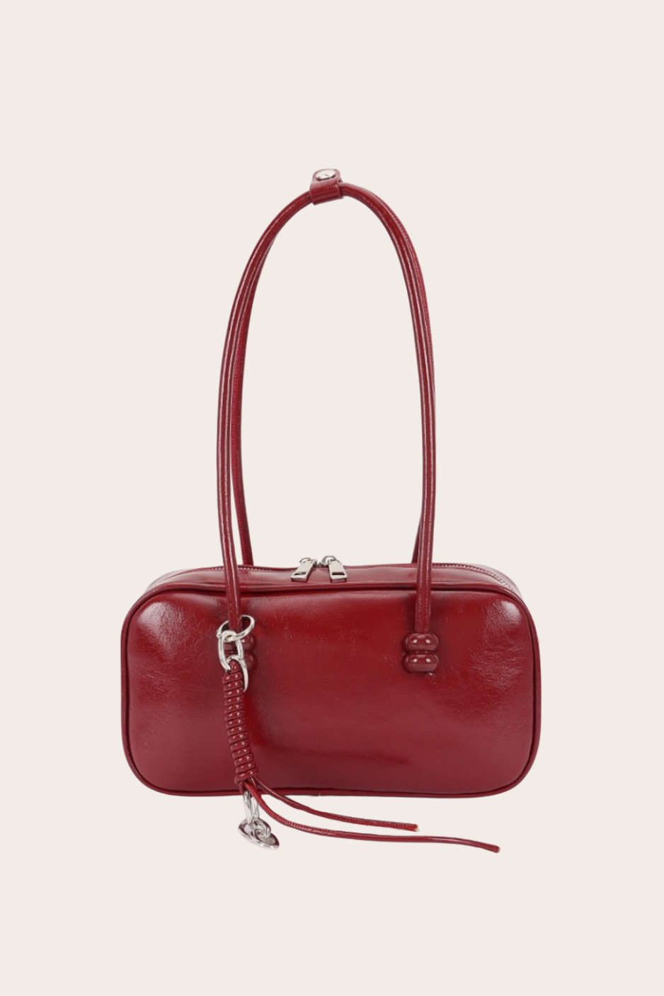 Burgundy East-West Bag, burgundy east-west bag featuring an elongated east-west silhouette with an included bag charm
