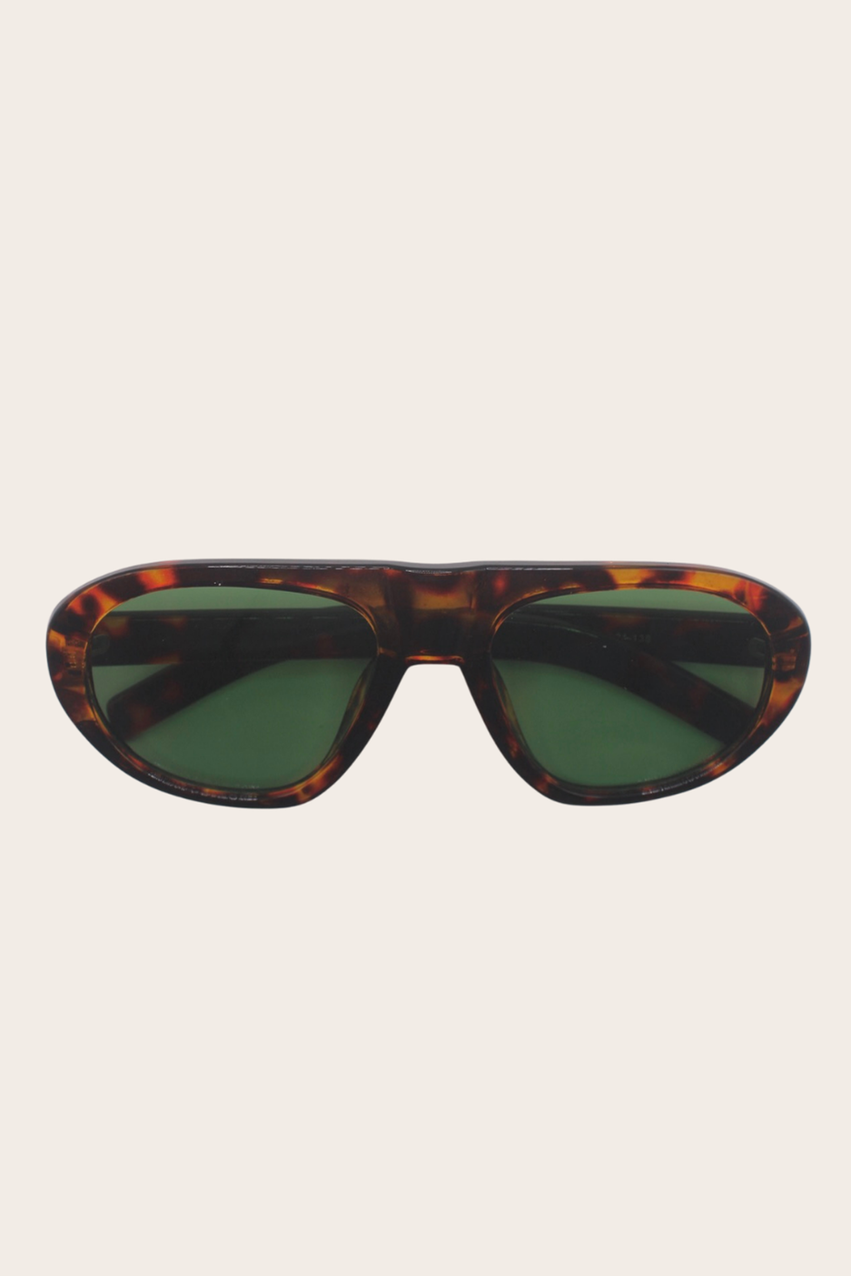 Zoe Print Sunglasses featuring a slim dark cat-eye frame with brown lenses