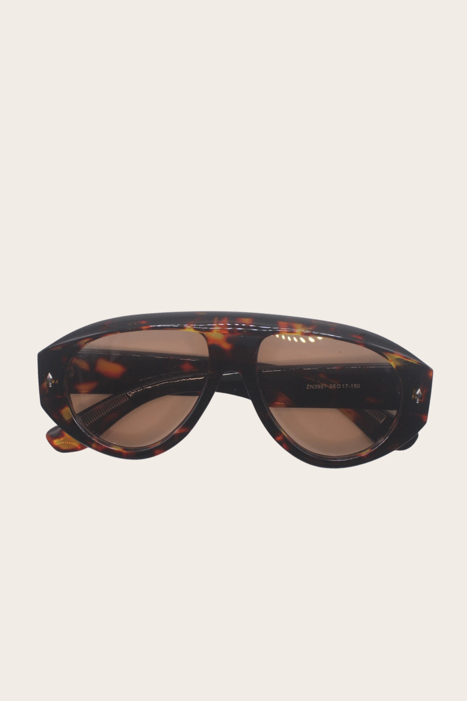 Arya Print Sunglasses featuring a colorful printed rectangular frame with green lenses