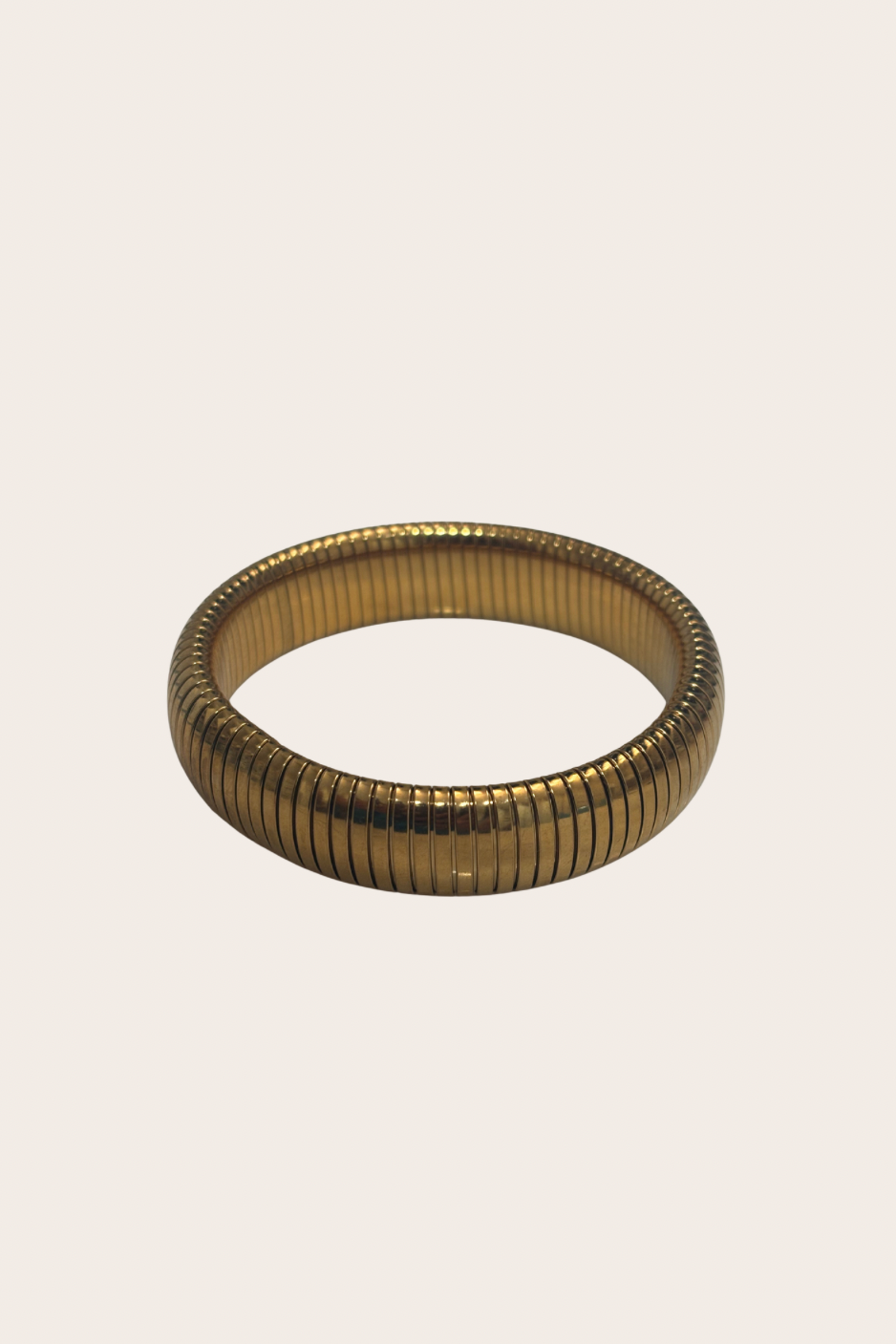 Indira Mid Bangle, gold bangle featuring a medium-width silhouette that balances presence with easy styling