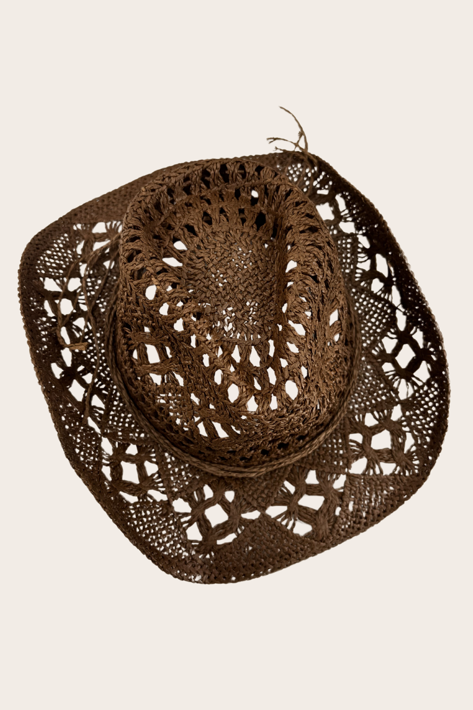 Lía Brown Cowboy Hat featuring a brown open-weave western silhouette