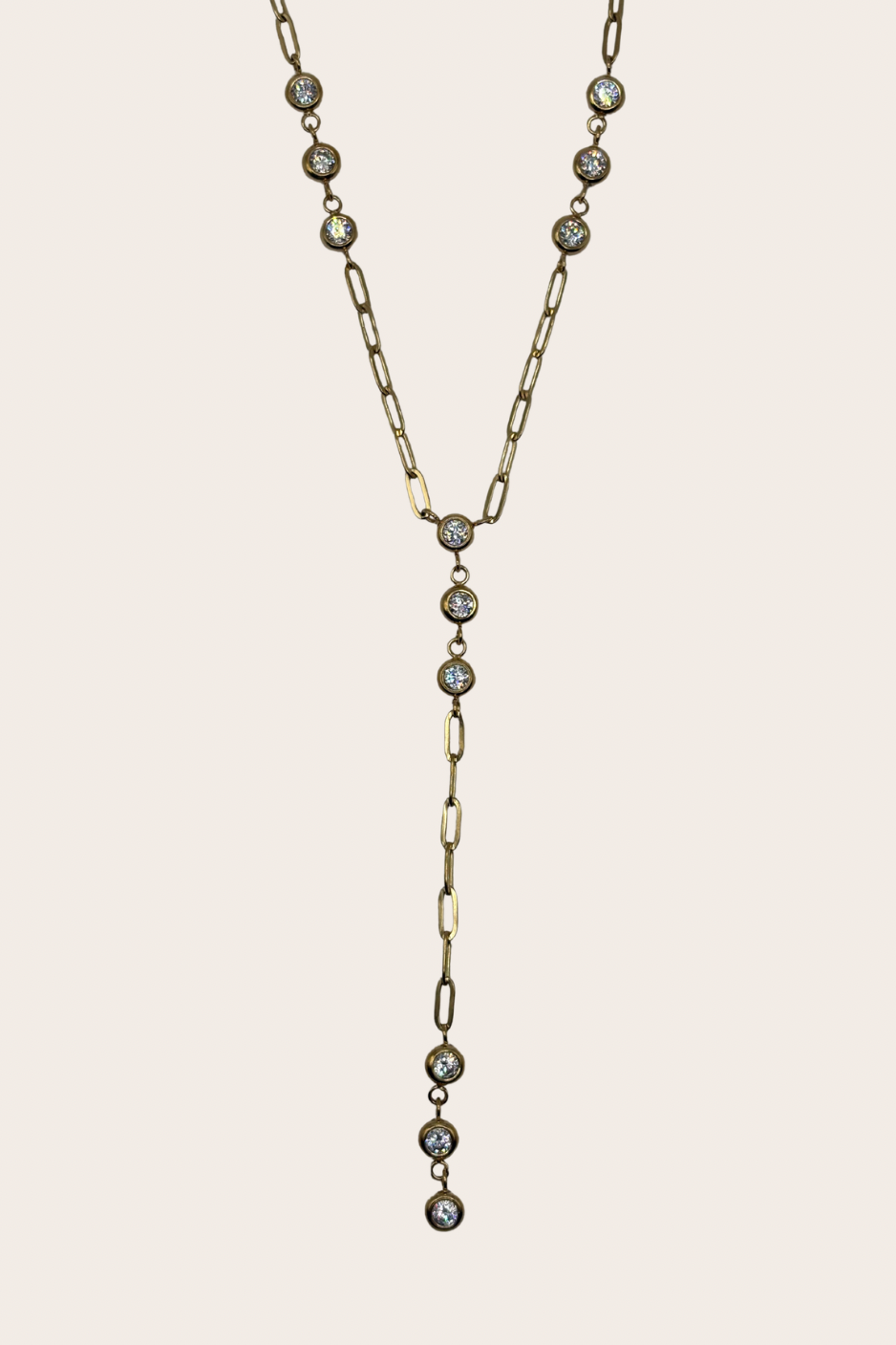 Paperclip Diamonds Lariat, gold necklace with paperclip-style links accented with sparkling diamond-inspired details and a lariat drop