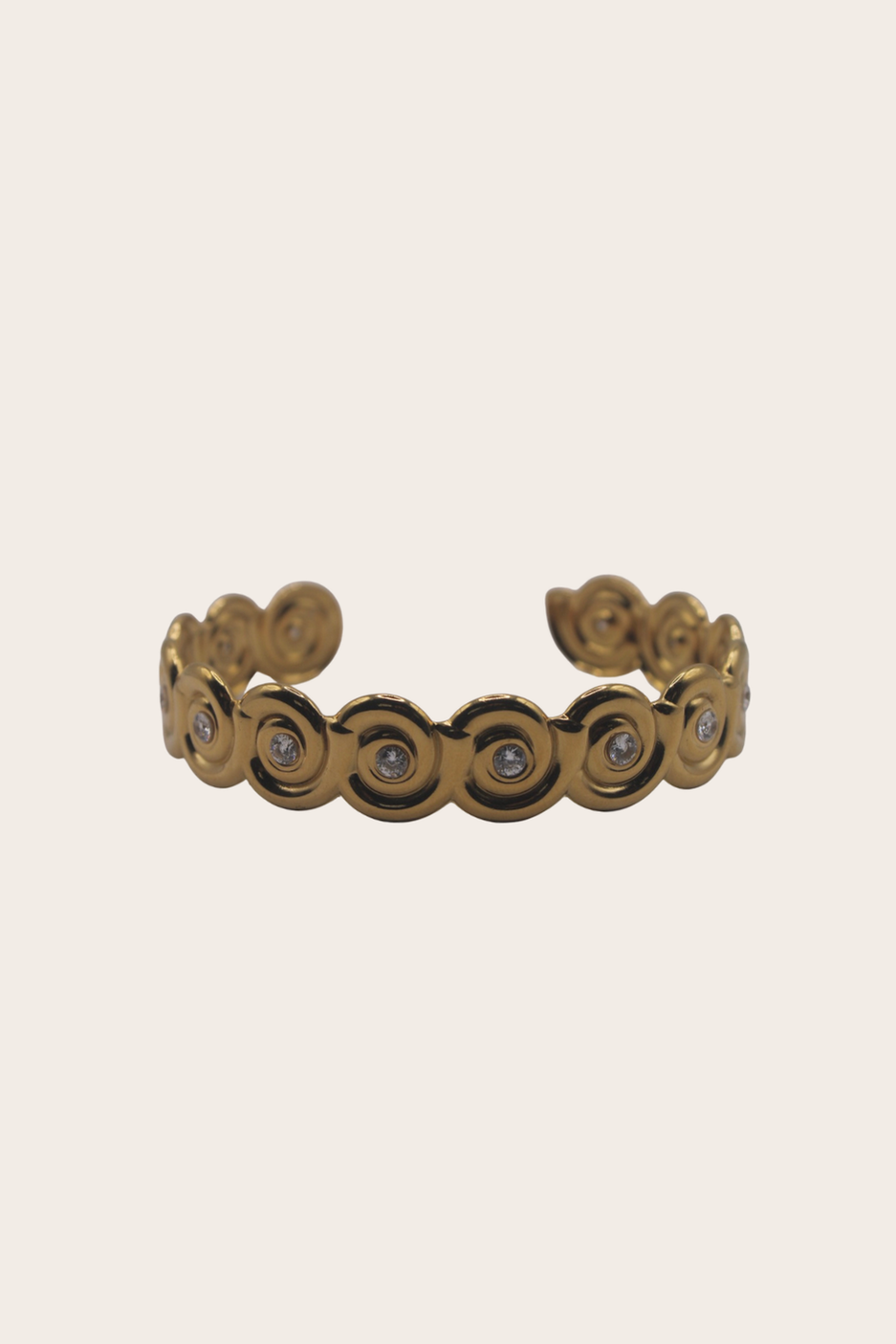 Lilo Cuff featuring a patterned open cuff with repeating circular details