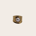 Pearl Golden Ring featuring a wide polished band with a pearl-style center