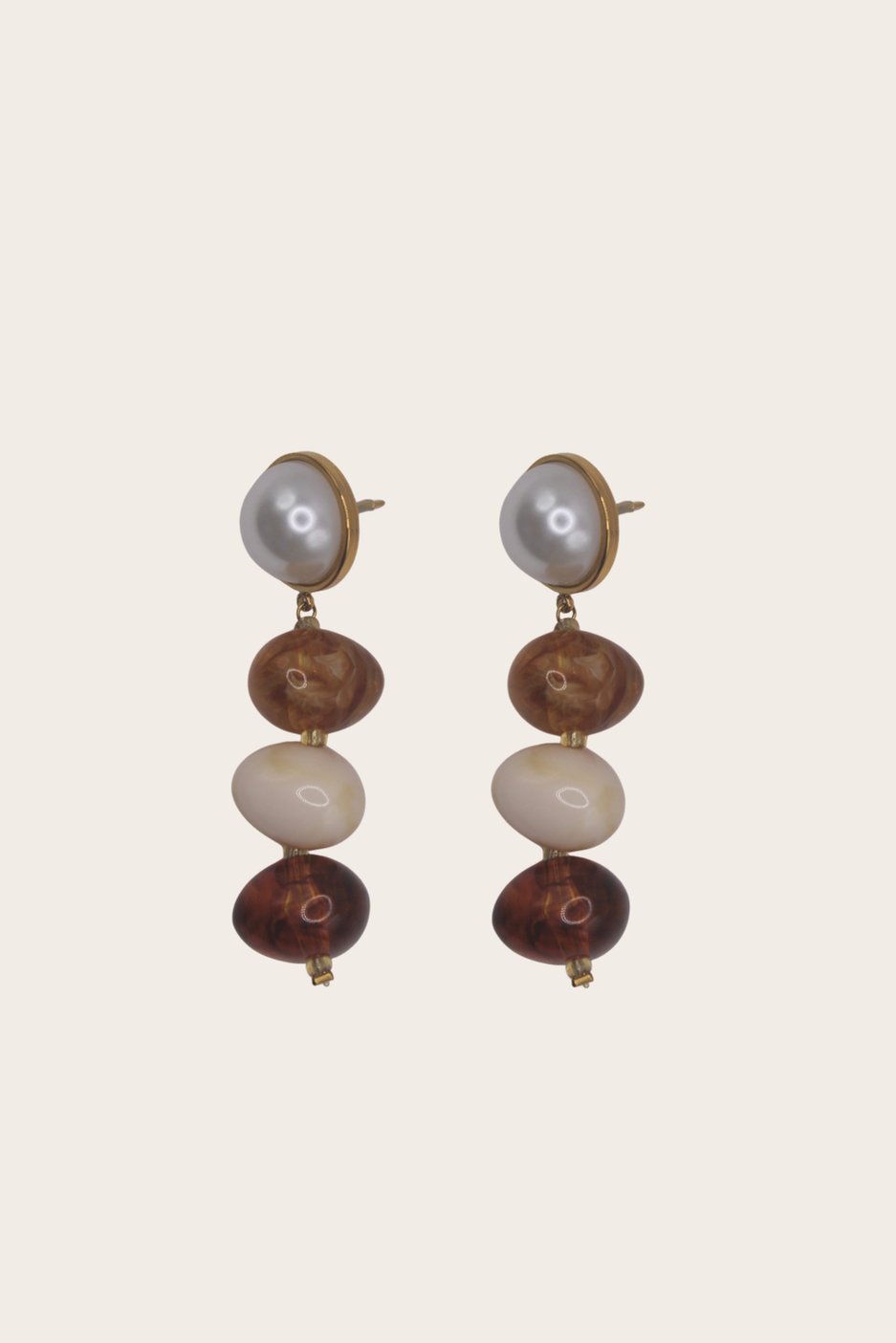 Amber Pearl Earrings featuring stacked amber, cream, and pearl-style drops