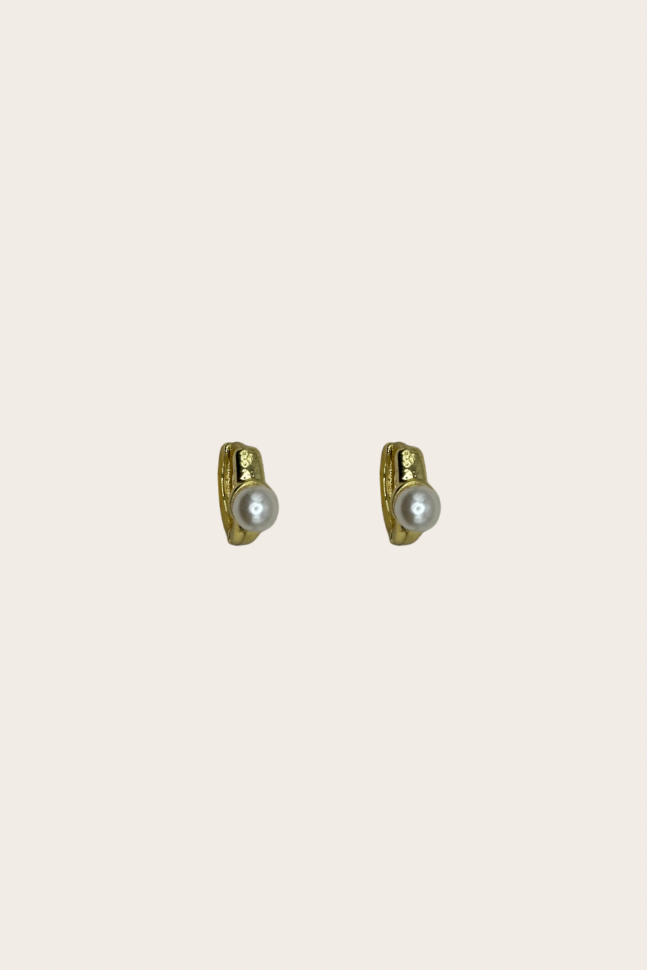 Pearl Huggies, gold and pearl white earrings with small huggie hoops accented with pearl details